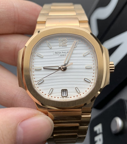Patek Phillipe Nautilus rose gold white face