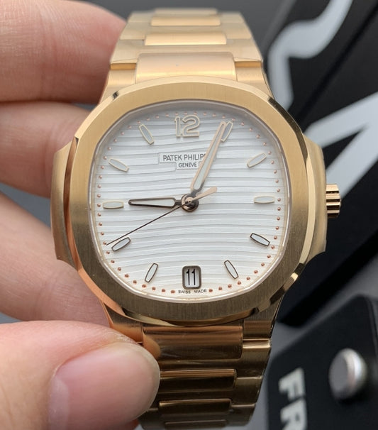 Patek Phillipe Nautilus rose gold white face