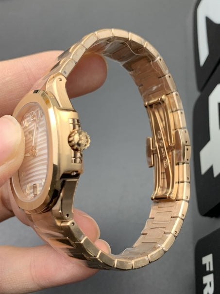 Patek Phillipe Nautilus rose gold white face