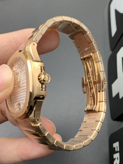 Patek Phillipe Nautilus rose gold white face