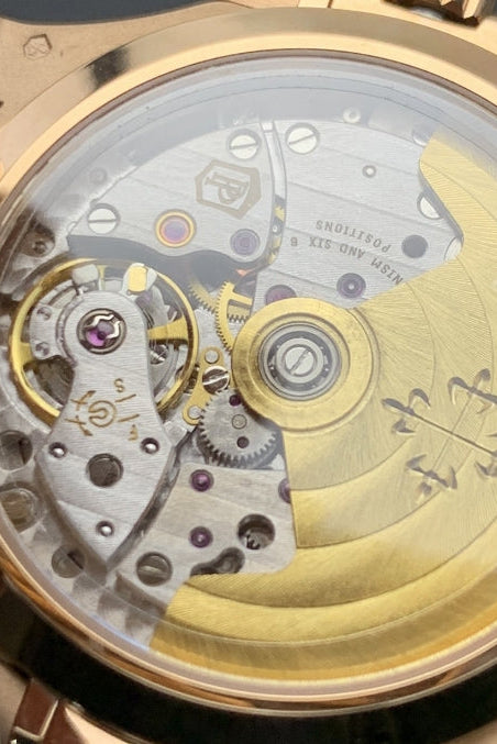 Patek Phillipe Nautilus rose gold white face