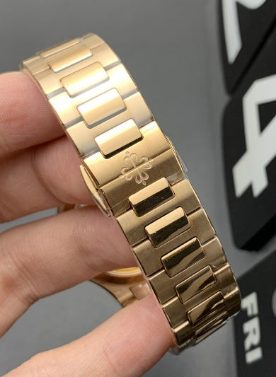 Patek Phillipe Nautilus rose gold white face